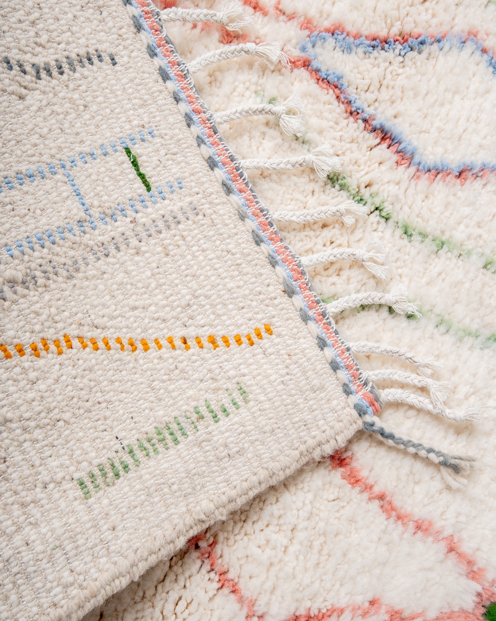 Modern, designer, handcrafted Berber rug from Morocco. Beniourain carpet with beautiful colours and patterns and fluffy wool texture.
